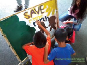 A small call. Little hands painting their advocacy to save the Earth and make a difference. Photo by Carmela Balcita