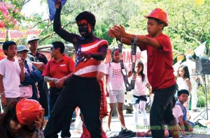 PORTRAYING THE CULPRIT. Members of Anakpawis Youth Cultural Group show how different classes and sectors of the Philippine society suffer from inequality in the system and how will they overcome it. Photo by Delia Bagni