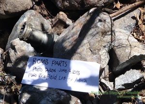 BOMB SHELL. This is what is left of the bomb that fell on the stone wall of the Pugo Rice field in Barangay Lat-ey, Malibcong, Abra after Philippine Army troopers launched an airstrike in the area. Photo courtesy of Innabuyog-Gabriela