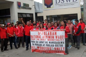 ALL WORKERS UNITY. Employees from the private sector as well as public offices renew their demand for a P16,000 National Minimum Monthly Wage to enable a family of six to survive for a month. Photo by Aldwin Quitasol