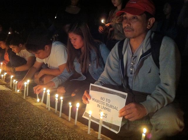 National Democratic Front of the Philippines Consultant for Cordillera and National Minority Affairs joined a candle lighting activity at the gates of the Supreme Court premises in Baguio City in protest to the ruling that allowed the burial of the late Dictator at the Libingan ng mga Bayani. Photo by Noel Godinez