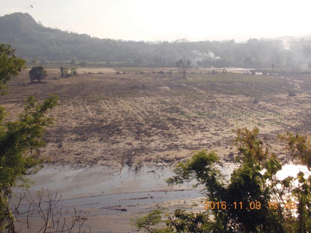 COVERED. Farms along the Chico River in Kalinga covered with silt after typhoon battered Northern Luzon still needs to be cleared. Photo by Donna Rabang Peta