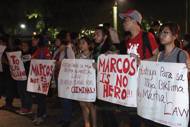 INJUSTICE. Protesters say that the Supreme Court decision allowing the burial of the late Ferdinand Marcos at the Libingan ng mga Bayani is an injustice against victims of Martial Law. Photo by Divine Peñaflor